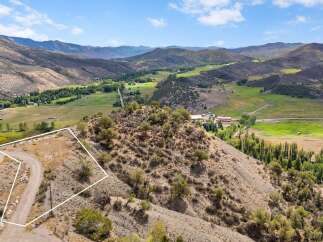 Discover breathtaking panoramic views from this prime elevated lot, offering a unique opportunity to build your dream home amidst stunning natural beauty.