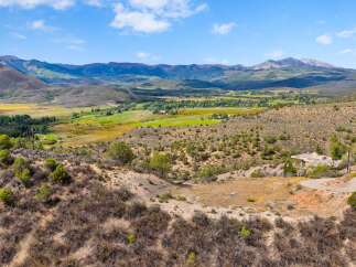 Discover this stunning property nestled in a picturesque valley with breathtaking mountain views.