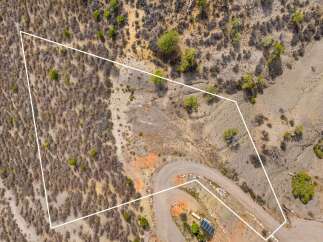 Discover this expansive parcel of land, offering a unique opportunity for development or a private retreat.