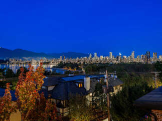 Experience breathtaking panoramic views of the city skyline and mountains from this stunning property.