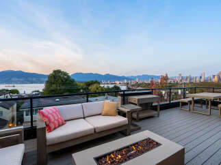 Experience breathtaking panoramic views from this stunning rooftop deck, perfect for entertaining or relaxing.