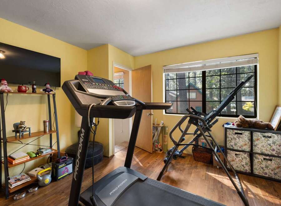 Transform your home into a personal fitness sanctuary with this dedicated workout space.