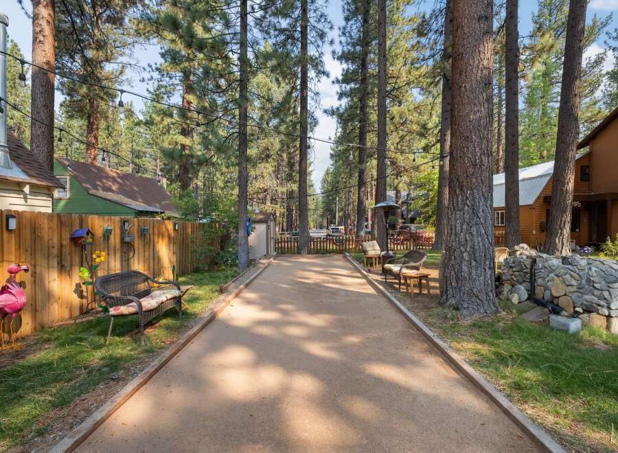 Enjoy outdoor fun on this property featuring a dedicated bocce ball court, perfect for friendly competition.