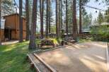 Enjoy outdoor fun in this spacious backyard featuring a bocce ball court perfect for friendly competition.