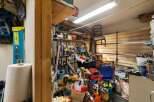 This garage space offers ample storage solutions for all your tools and equipment.