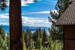 Experience breathtaking lake and mountain views from this stunning property, nestled amongst mature pine trees.