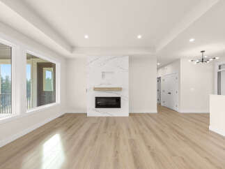 Experience modern living in this spacious open-concept living area, featuring a stunning marble fireplace as the focal point.