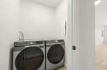 Discover modern convenience with this stacked Samsung washer and dryer set, perfect for any laundry room.