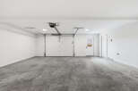Discover this spacious and clean garage, perfect for your vehicles and storage needs.