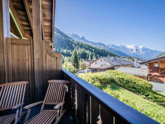Enjoy breathtaking mountain views from the private balcony of this charming property.