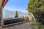 Experience breathtaking panoramic views of the lake and majestic mountains from this property's balcony.