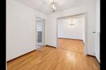 Step into this inviting space featuring gleaming hardwood floors that extend throughout the home.