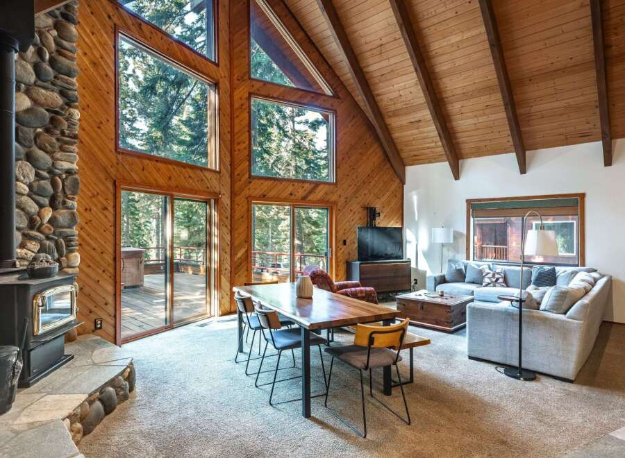 Experience rustic charm and modern comfort in this stunning mountain retreat.