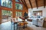 Experience rustic charm and modern comfort in this stunning A-frame cabin living space.
