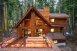 Experience the ultimate mountain retreat in this stunning A-frame cabin nestled amongst tall pines.
