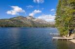 Experience serene lakefront living with this stunning property, featuring private docks perfect for your boat or morning coffee.