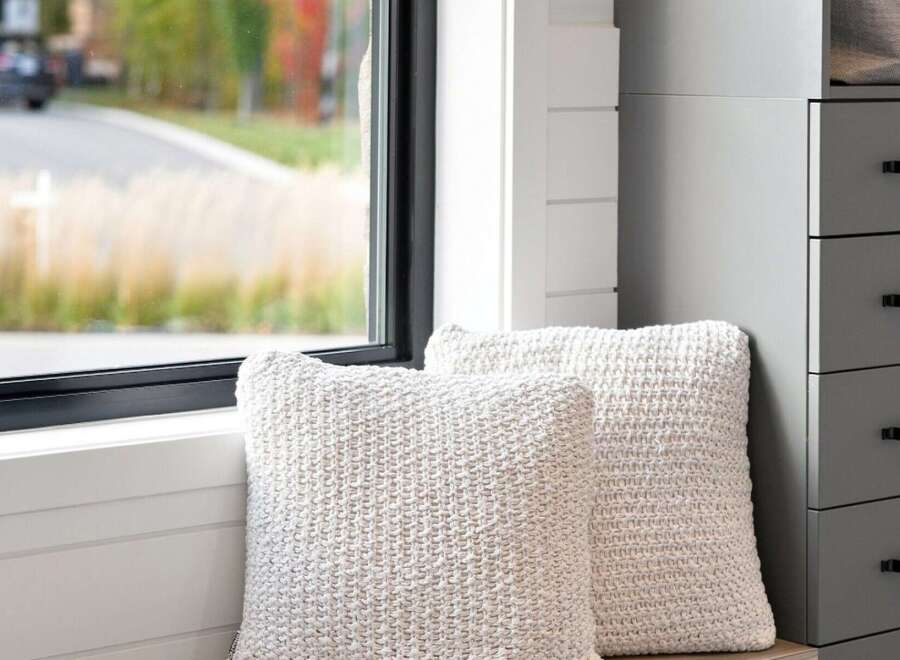 Experience cozy living with these plush, textured throw pillows, perfect for adding comfort and style to your home.