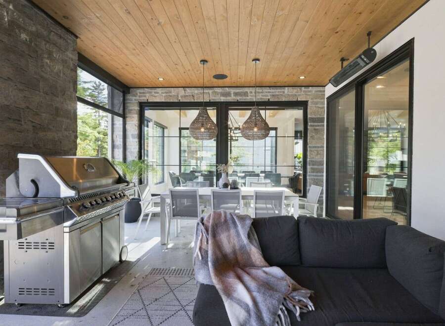 Experience seamless indoor-outdoor living with this stunning covered patio, perfect for entertaining.