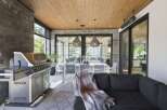 Experience seamless indoor-outdoor living with this stunning covered patio, perfect for entertaining.