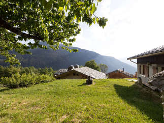 Nestled in a picturesque mountain landscape, this property offers a serene retreat with charming alpine architecture.