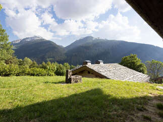 Nestled amidst the majestic Alps, this charming property offers a serene mountain retreat.