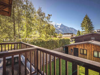 Enjoy breathtaking mountain views from this charming property's private balcony, perfect for morning coffee or evening relaxation.