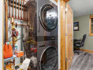 Discover the convenience of a stacked washer and dryer, perfect for maximizing space in your laundry area.