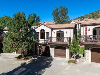 Experience luxury living in this stunning multi-level home featuring a spacious balcony perfect for enjoying scenic views.