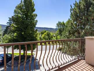 Enjoy breathtaking mountain views from this charming balcony, perfect for morning coffee or evening relaxation.