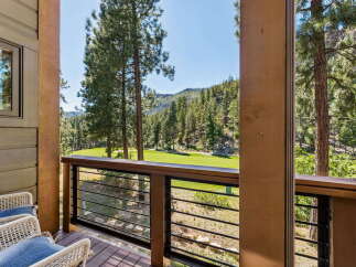 Enjoy breathtaking mountain views and pristine golf course vistas from this stunning property's private balcony.