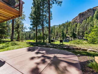 Enjoy breathtaking mountain views from this stunning property, featuring a spacious patio perfect for outdoor entertaining.
