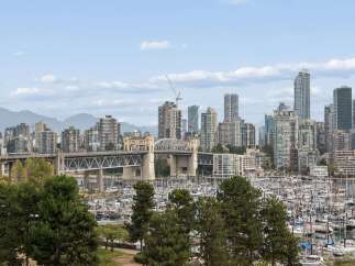 Experience luxury waterfront living with stunning views of the city skyline and a bustling marina.