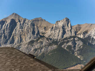 Experience breathtaking mountain views from this property, offering a serene escape with majestic peaks as your backdrop.