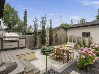 Experience outdoor living at its finest with this beautifully designed backyard oasis.