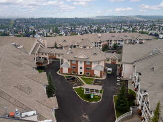 Discover this expansive multi-unit residential complex, featuring a charming central courtyard with a gazebo and ample parking.