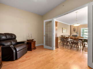 Step into this inviting living space featuring a plush leather recliner perfect for relaxation.