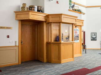 Step into a world of cinematic charm with this unique property featuring a dedicated 'Sierras Cinema' area, complete with a ticket booth and vintage movie posters.
