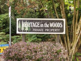 Discover the tranquility of Heritage in the Woods, a private property offering a serene escape surrounded by lush greenery.