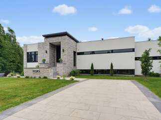 For Sale in Mirabel with 4 Bedrooms and 4 Bathrooms