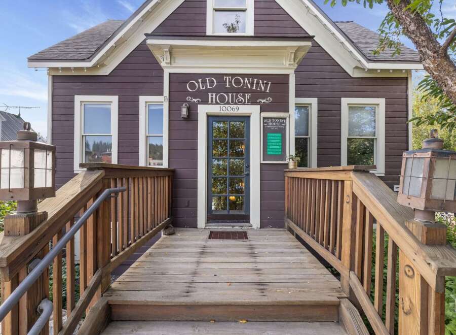 Step into the historic charm of the Old Tonini House, a beautifully preserved property offering a unique blend of vintage character and modern potential.
