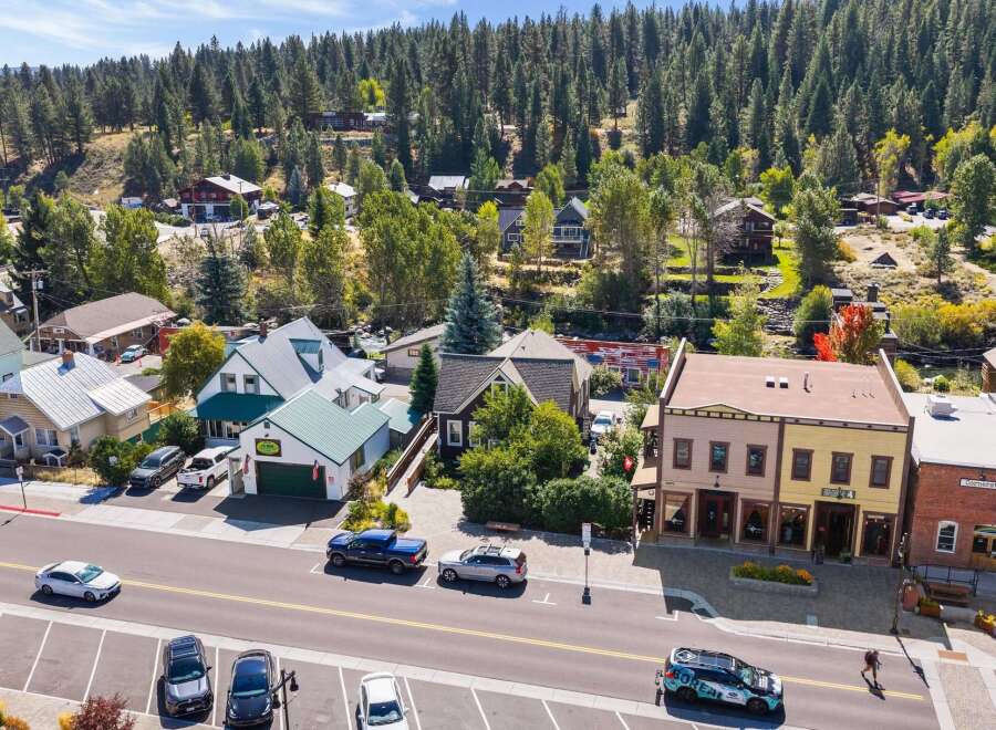 Discover this charming commercial property nestled in a picturesque mountain town, perfect for a business seeking a vibrant location.