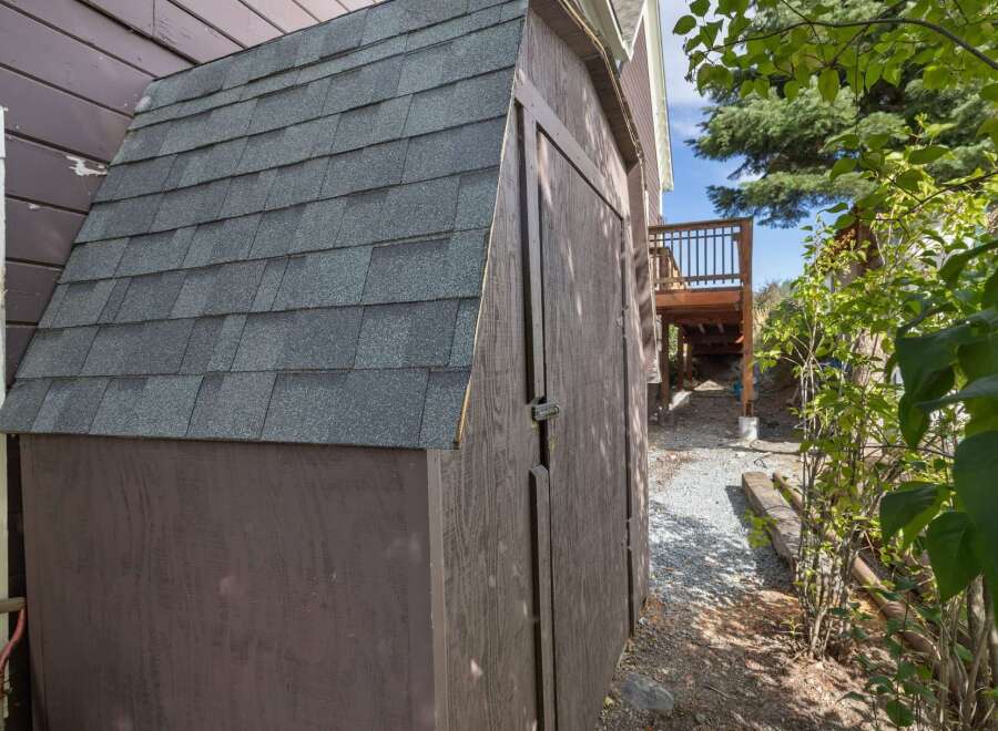 Discover this charming property featuring a practical shed, perfect for storage or a workshop.