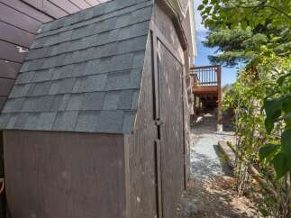 Discover this charming property featuring a practical shed, perfect for storage or a workshop.