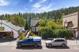 Discover this charming property nestled amidst a lush forest backdrop, offering a unique blend of residential and commercial potential.