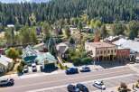 Discover this charming property nestled in a picturesque mountain town, offering a unique blend of residential comfort and commercial potential.