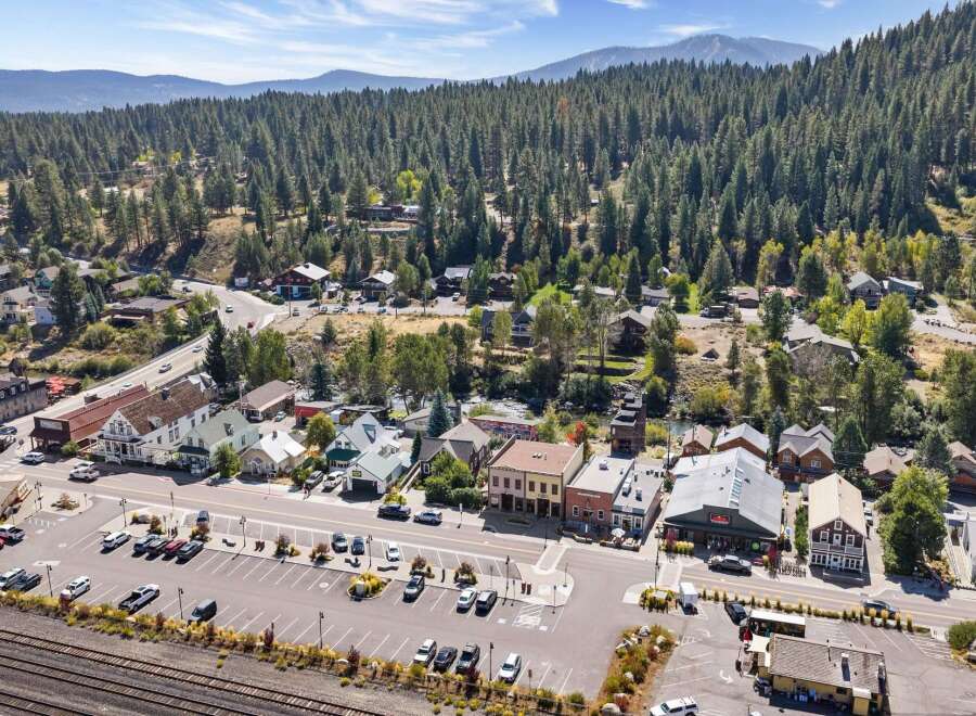 Discover this charming mountain town commercial property, ideally situated in a bustling downtown area with ample parking and high visibility.