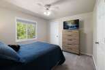 This bedroom offers a comfortable and inviting atmosphere, perfect for relaxation.
