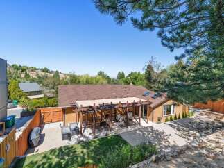 Discover this charming home with a spacious backyard perfect for entertaining.