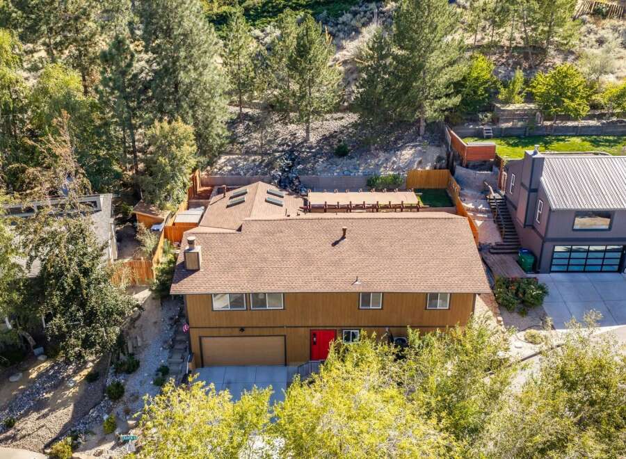 Discover this stunning property featuring a spacious backyard with a covered patio, perfect for outdoor entertaining.