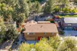 Discover this stunning property featuring a spacious backyard with a covered patio, perfect for outdoor entertaining.